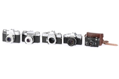 Lot 149 - A Rollei 35 Camera and Four 35mm SLR Cameras