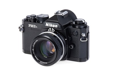Lot 115 - A Nikon FM3a SLR Camera Outfit