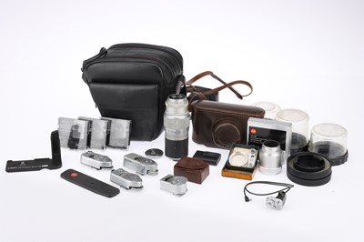 Lot 21 - A Leitz Hektor f/4.5 13.5cm Lens and Various Leica Accessories