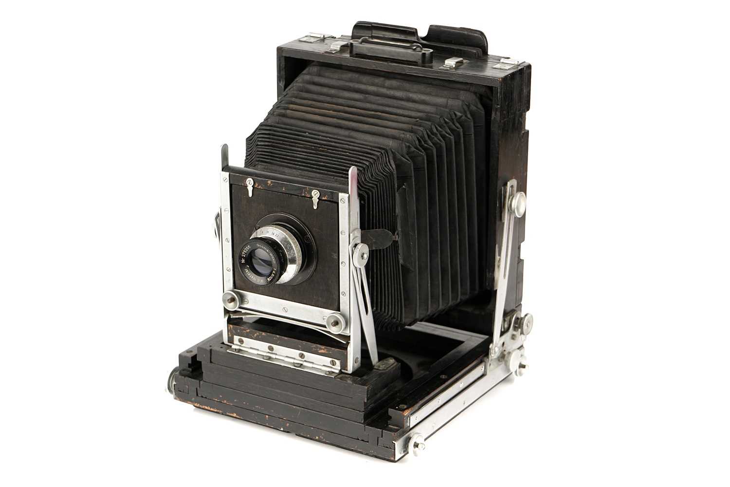 Lot 452 - An Unmarked Black Painted Mahogany Half Plate Field Camera