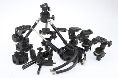 Lot 510 - A Good Collection of Tripod Heads / Supports