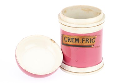 Lot 776 - A Ceramic Pink & Cream Apothecary Jar