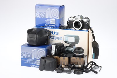 Lot 182 - An Olympus OM10 Complete System from Dixons