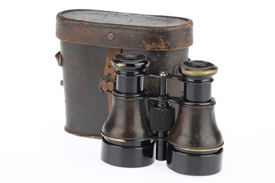 Lot 735 - A Small Pair of Binoculars