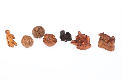 Lot 887 - A Good Selection of Wooden Carved Netsuke.