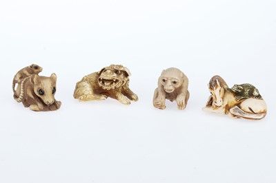 Lot 888 - Four Chinese Resin Netsuke