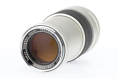 Lot 111 - A Topcon Super DM 35mm SLR Camera Outfit