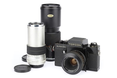 Lot 111 - A Topcon Super DM 35mm SLR Camera Outfit