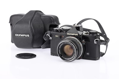 Lot 185 - A Black Olympus OM-2 MD 35mm SLR Camera