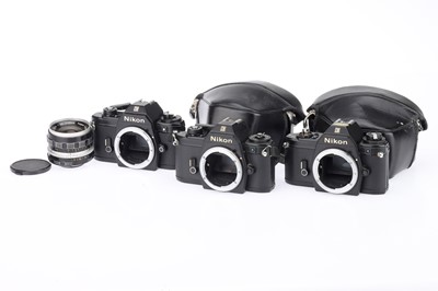 Lot 66 - Three Nikon EM 35mm SLR Cameras