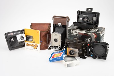 Lot 152 - A Group of Instant Film Cameras