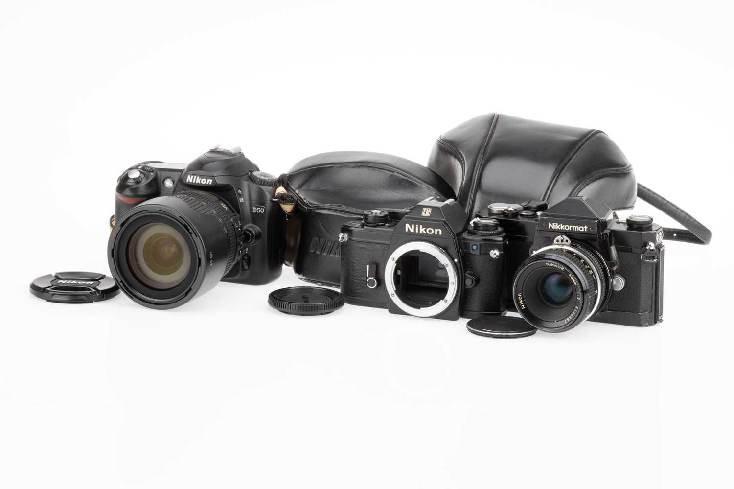 Lot 31 - Three Nikon SLR Cameras