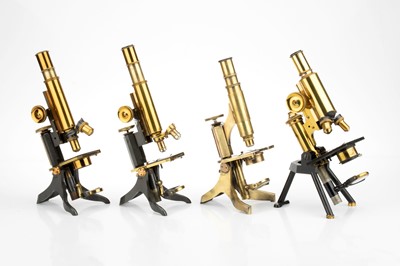 Lot 364 - A Collection of 4 Compound Brass Microscopes by Swift