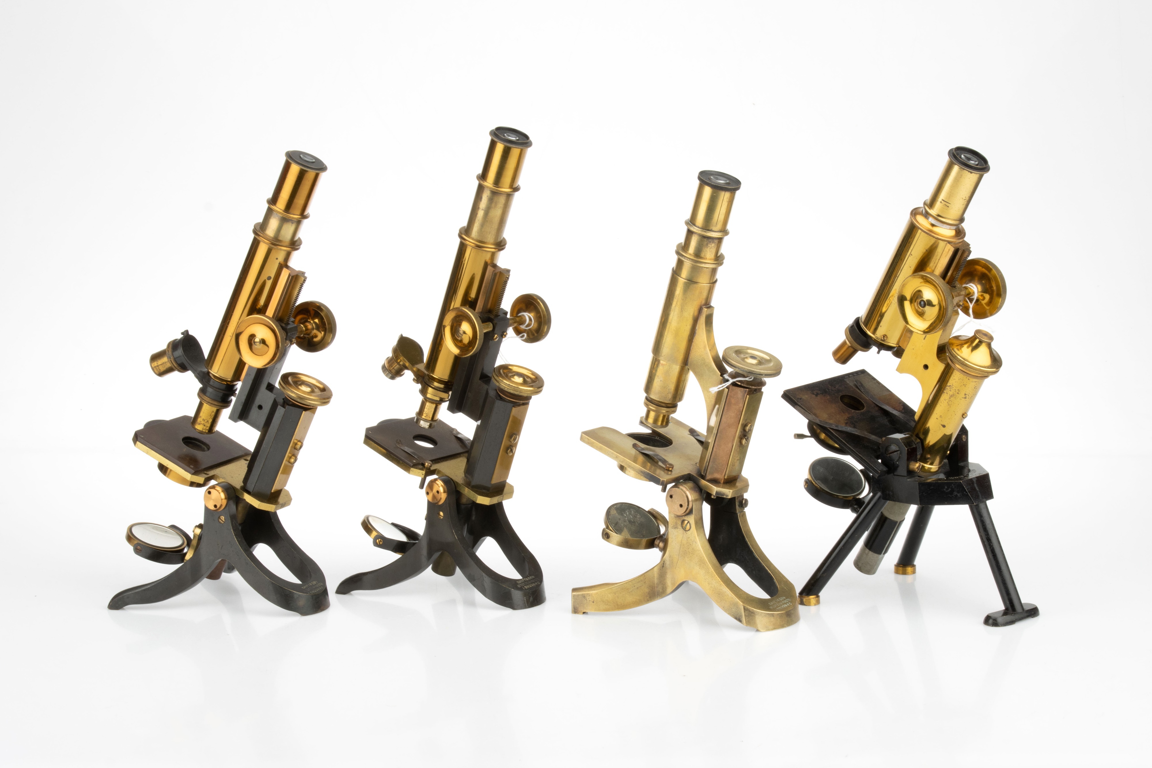 Lot 364 - A Collection of 4 Compound Brass Microscopes