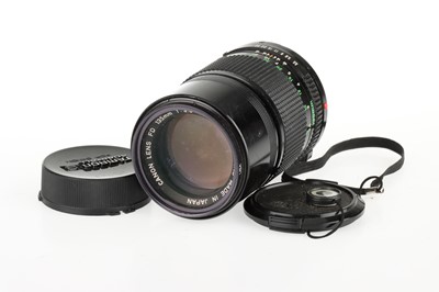 Lot 64 - A Canon A-1 35mm SLR Camera and Lenses