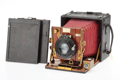 Lot 212 - A Sanderson Half Plate Hand & Stand Folding Camera