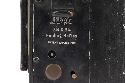 Lot 199 - A Newman & Guardia 3¼ x 3¼ Folding Reflex SLR Camera
