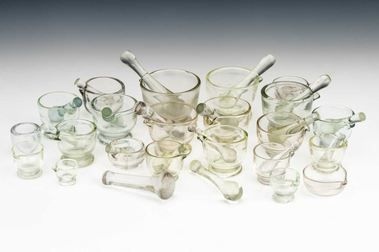 Lot 55 - A Large Collection of Glass Mortar & Pestles