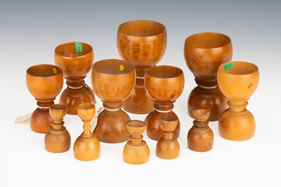 Lot 52 - A Collection of Turned Apothecary's Boxwood Measures