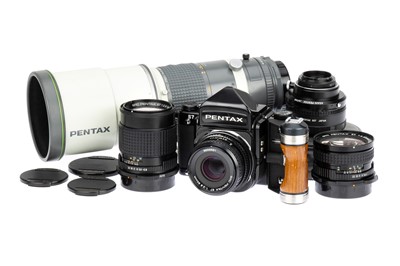 Lot 148 - An Asahi Pentax 67 Medium Format Camera Outfit