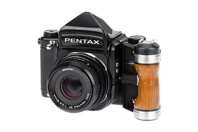 Lot 148 - An Asahi Pentax 67 Medium Format Camera Outfit