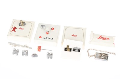 Lot 77 - A Selection of Leica Pin Badges & Accessories