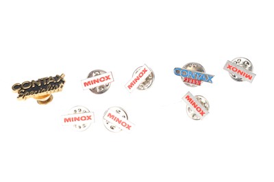 Lot 76 - A Small Selection of Contax & Minox Enamelled Pin Badges