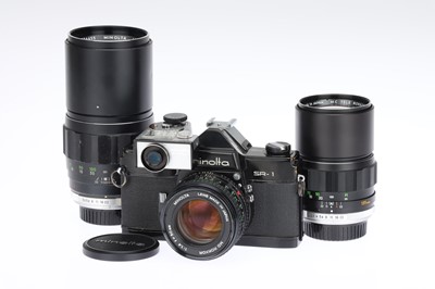 Lot 214 - A Minolta SR-1 35mm SLR Camera and Lenses