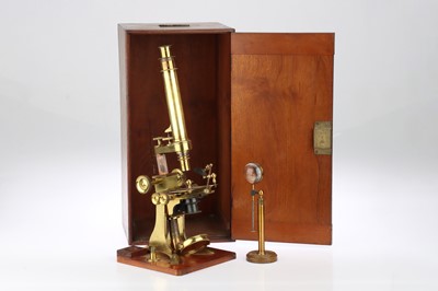 Lot 595 - A Victorian Brass Compound Microscope By Baker