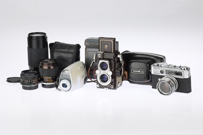 Lot 199 - A Selection of Yashica Cameras & Lenes