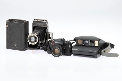 Lot 307 - Two Zeiss Ikon Folding Cameras and a Pentax SLR Camera