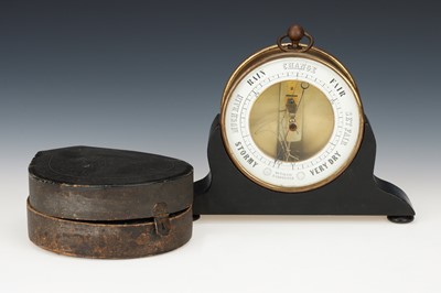 Lot 168 - A Bourdon Barometer with case & Stand
