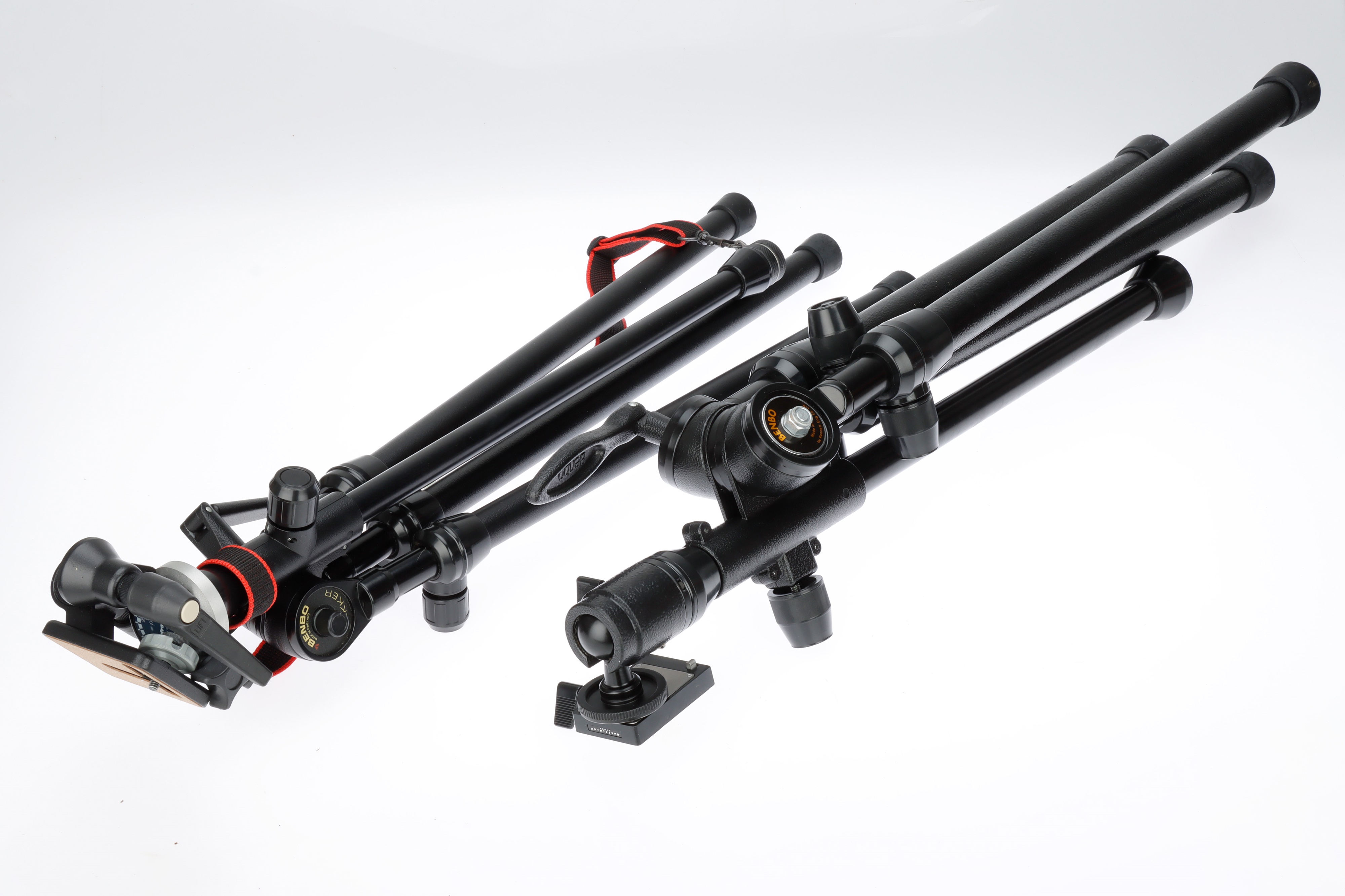 Lot 574 - Two Benbo Trekker Tripods,