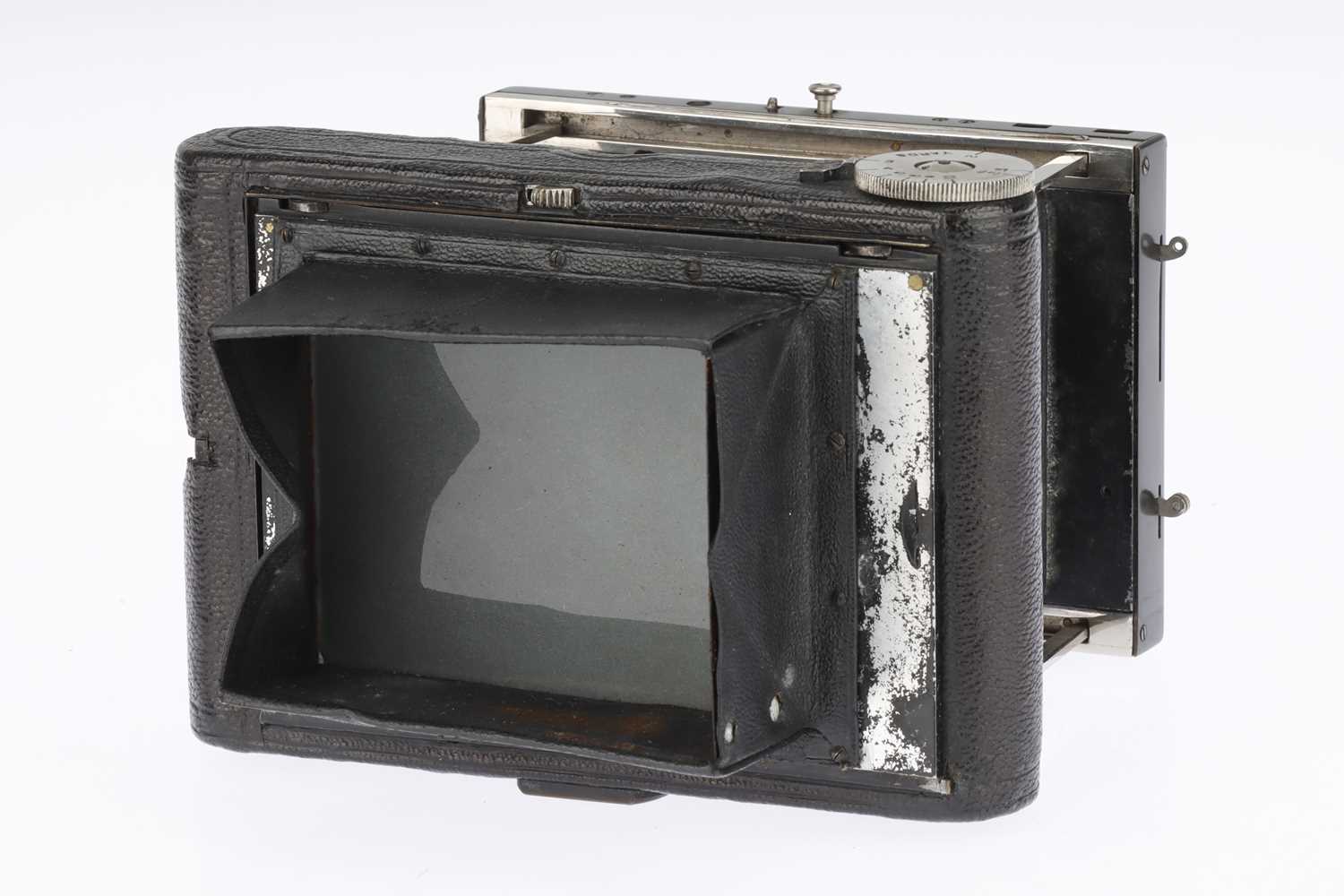 Struts Camera Lot 326 - A Goerz C.D.V. Tenax Folding Strut Camera,