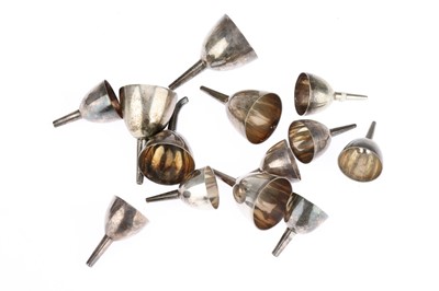 Lot 672 - A Large Collection of small Silver & White Metal Funnels