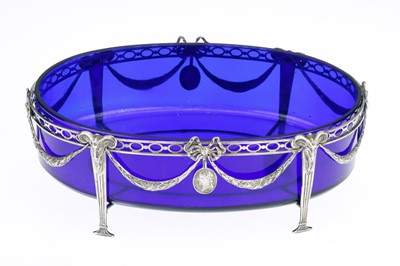 Lot 847 - White Metal and Bristol Blue Glass Table Centre