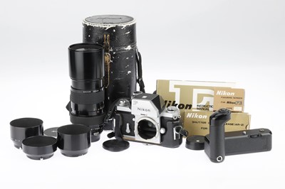 Lot 583 - A Nikon Photomic FTn 35mm SLR Body and Accessories