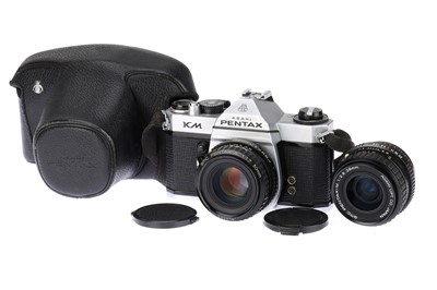 Lot 119 - A Pentax KM 35mm SLR Camera