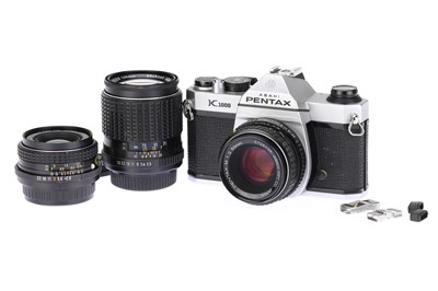 Lot 122 - A Pentax K1000 35mm SLR Camera Outfit