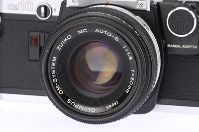 Lot 104 - Two Olympus OM Series 35mm SLR Cameras