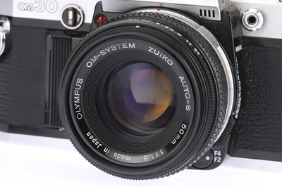 Lot 104 - Two Olympus OM Series 35mm SLR Cameras