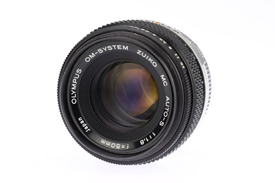 Lot 104 - Two Olympus OM Series 35mm SLR Cameras