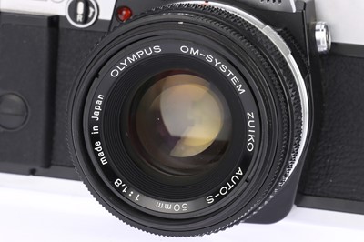 Lot 103 - An Olympus OM20 35mm SLR Camera