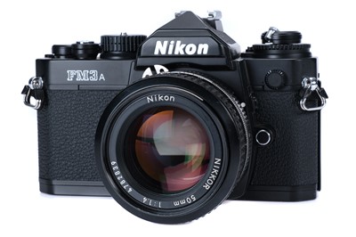 Lot 174 - A NIkon FM3a SLR Camera Outfit
