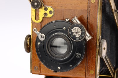 Lot 317 - A Lizars Challenge De Luxe Hand & Stand Mahogany & Brass Camera