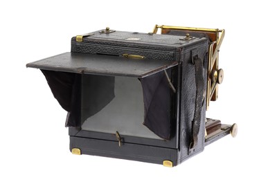Lot 317 - A Lizars Challenge De Luxe Hand & Stand Mahogany & Brass Camera