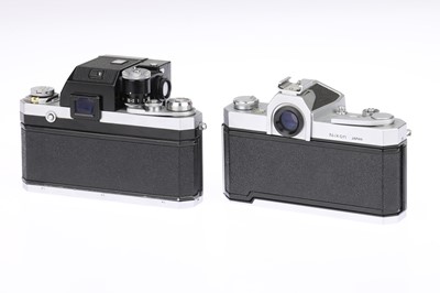Lot 60 - A Nikon F Photomic and a Nikkormat FTn 35mm SLR Cameras