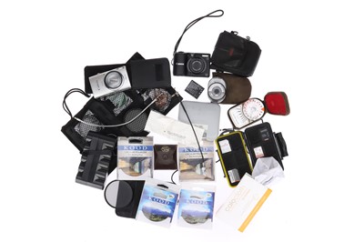 Lot 217 - A Collection of Two Compact Cameras and Various Accessories