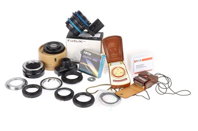 Lot 335 - A Collection of Various Camera Lens Adapters and Accessories