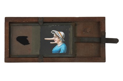 Lot 257 - Magic Lantern Slide of a Woman with Growing Chin & Nose